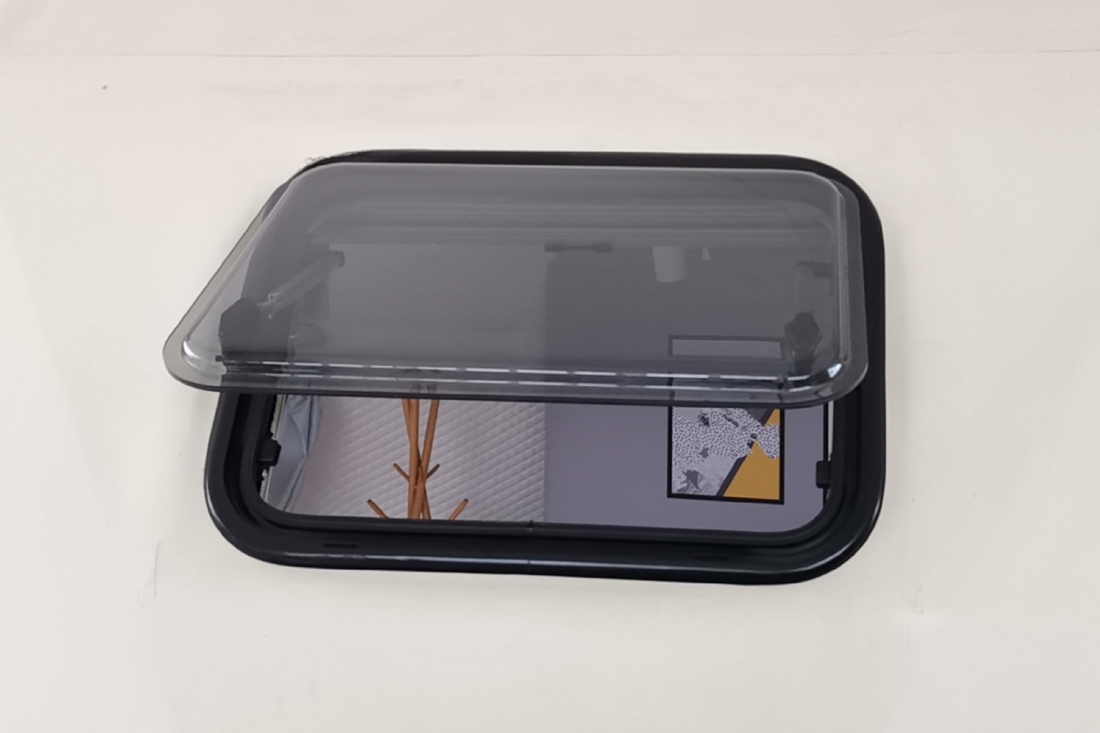 Alt text: "Open porthole window in a geodesic dome, showcasing the stylish interior design of a glamping pod. Ideal for luxury Airbnb, backyard dome, or geodesic dome house kit."